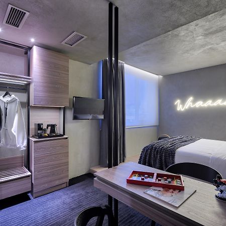 Onoma Hotel Thessaloniki Exterior photo A room at the hotel