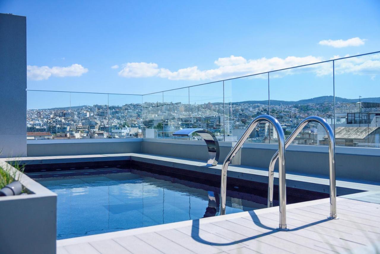 Onoma Hotel Thessaloniki Exterior photo A pool with a glass balustrade