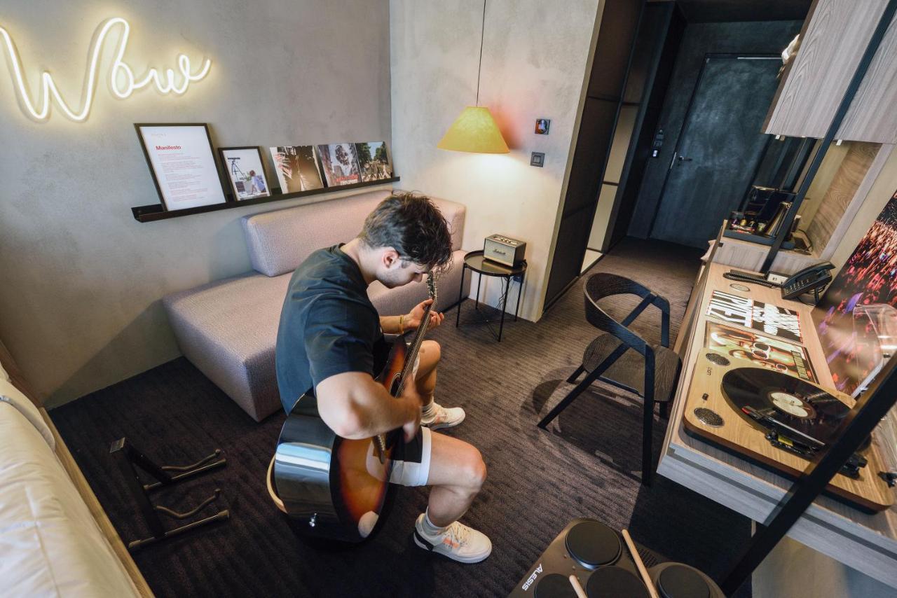 Onoma Hotel Thessaloniki Exterior photo A tattoo artist working in a studio